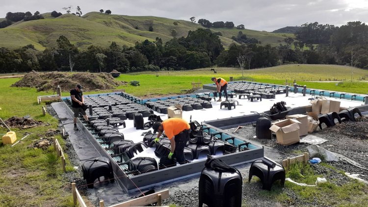 Mahurangi West - Builders Laying Down House Foundation
