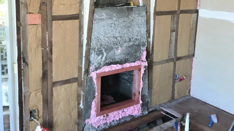 Kiwi House - Fireplace and wall insulation