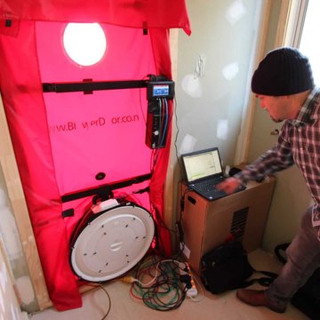 Man performing Blower Door testing