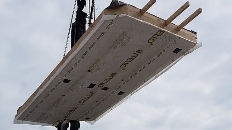Somerfield House - Crane applying THECA panel with INTELLO <sup>®</sup>  Intelligent Air Barrier