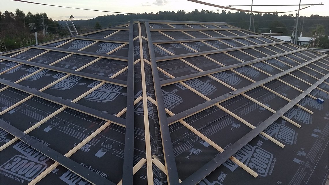 Regular battens (running horizontally) are then attached above the counter battens to form the fixing structure for the roof cladding