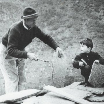 “Forever” Roof - An old photo of man and child fixing the roof