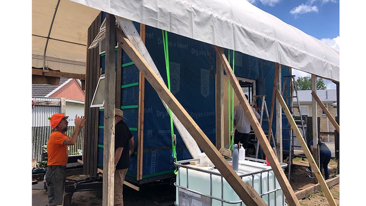 Tiny house annual workshop house covered with solitex extasana