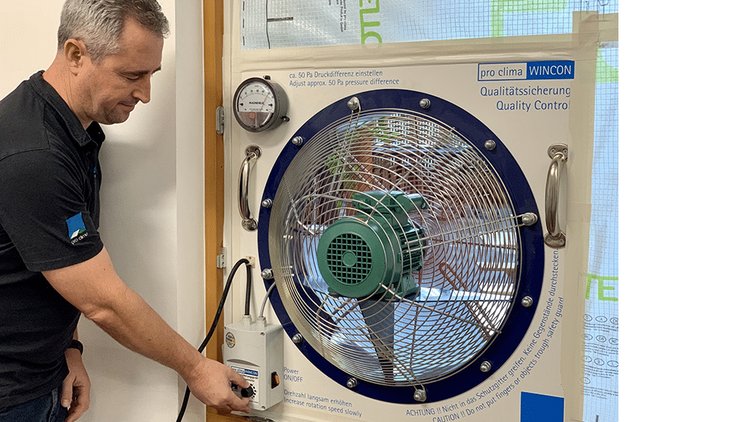WINCON - A man operating Wincon Fan